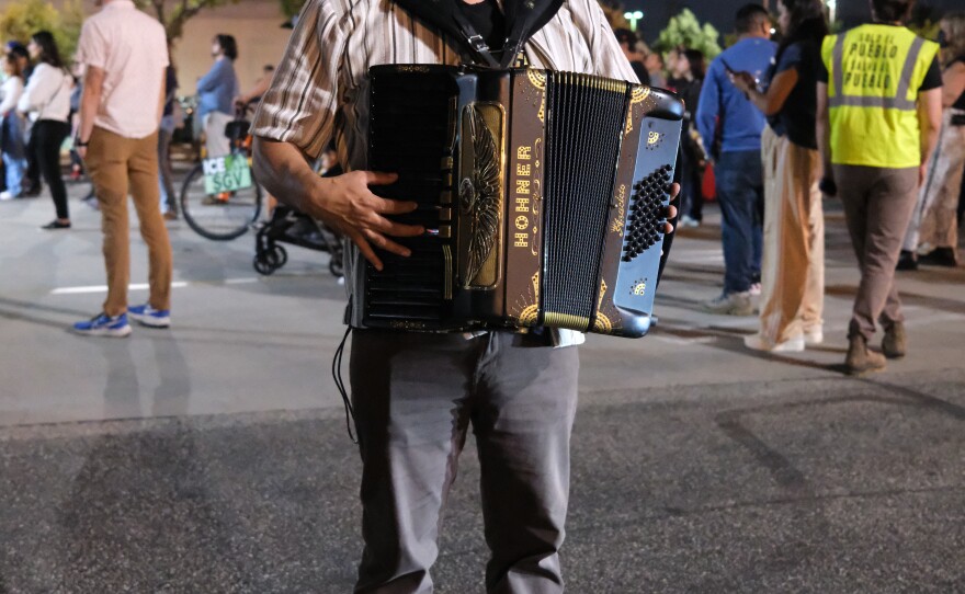 Band director Omar León is a community organizer and former day laborer, as are most of the band's members. He's also the band's songwriter and plays the accordion and keyboard.