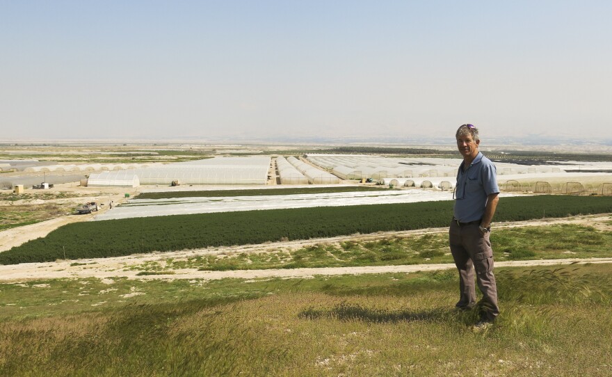 Israeli Inon Rosenblum raises herbs for export on Moshav Na'ama, an agriculture settlement in the Jordan Valley. Israel says control of this part of the West Bank is crucial for its security. Rosenblum receives scarce water, which is controlled by Israel, and employs Palestinians for field and packing work.