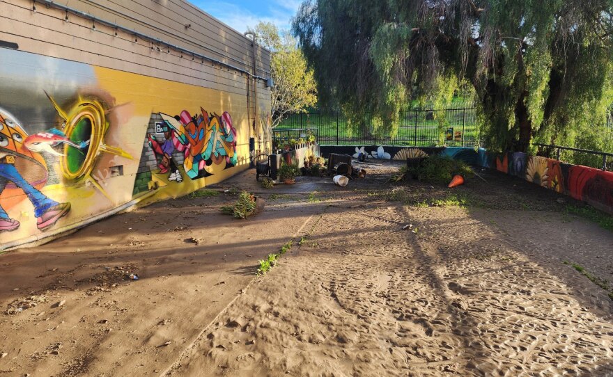 Flood and mud damage is shown on Thursday, Jan. 25, 2024 at artist Maxx Moses' Graffiti Gardens space in Southeast San Diego. Moses said the murals appear to be undamaged, but the surrounding garden space will need a lot of work to rebuild.