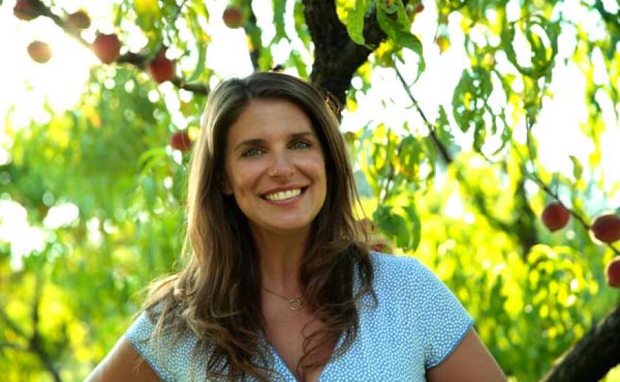 Vivian stands in front of a fig tree. In the third season of this Emmy-winning series featuring chef Vivian Howard, she and her husband, Ben Knight, juggle the pressures of running two restaurants and raising their young twins, while Vivian writes a new cookbook.
