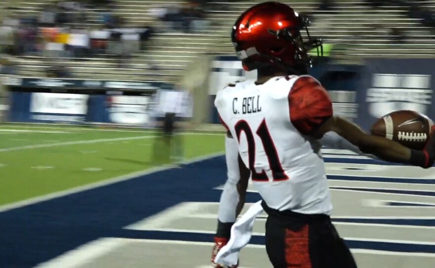 Running back Chance Bell runs the ball into the end zone for a touchdown against Utah State on Oct. 31, 2020.