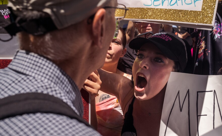 A small group of anti-abortion activists were confronted by supporters of the "Bans off Our Bodies" rally and protest march in downtown San Diego, May 14, 2022.