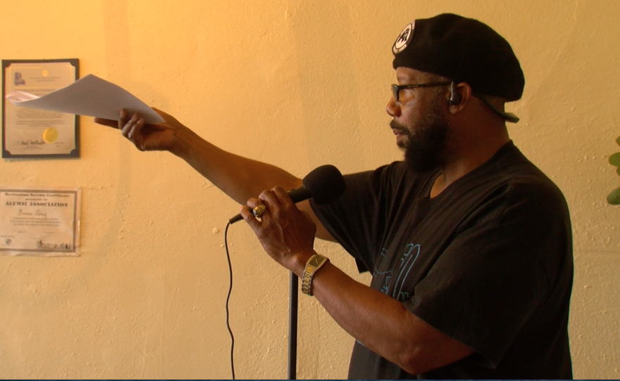 San Diego Black Panther Party Chairman Henry Wallace recites the group’s 10-point platform at recent meeting, February 18, 2017.