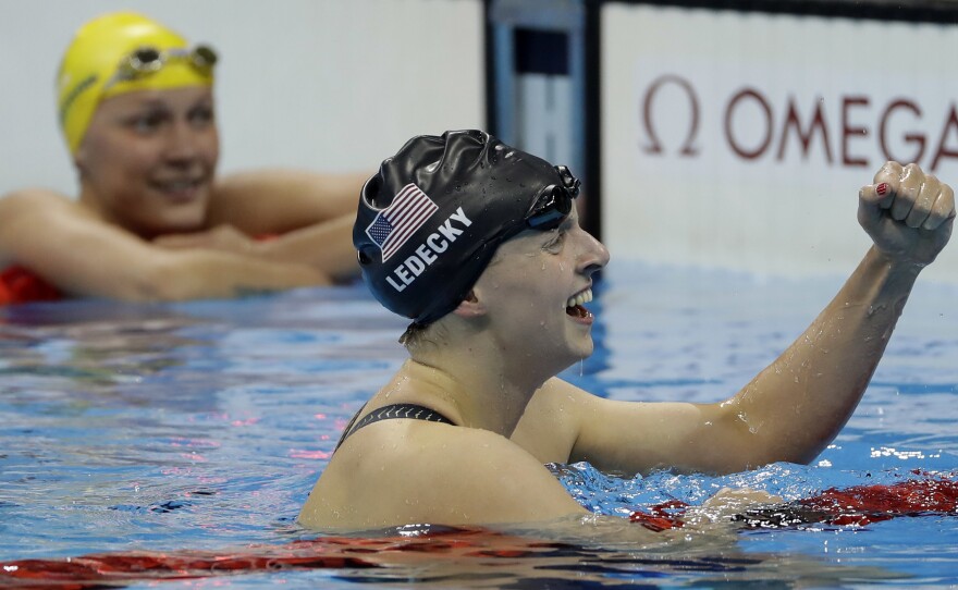Katie Ledecky celebrates after winning the gold Tuesday night in the 200-meter freestyle over Sweden's Sarah Sjostrom (left). Ledecky won the 400-meter freestyle previously and will be heavily favored in the 800-meter freestyle.