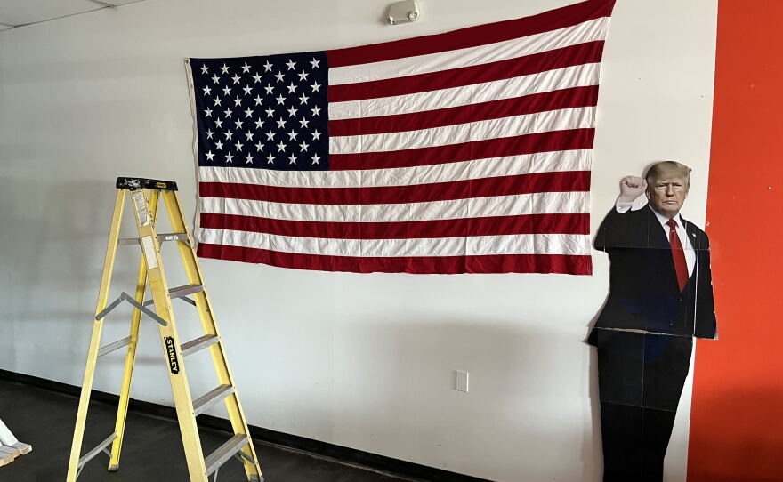 A life-sized cardboard cutout of President Trump is propped up in the Aroostook County Republican headquarters in Caribou, Maine.