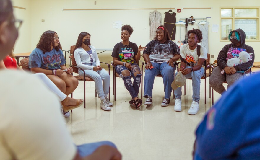 Members of the Steve's Club interact during a group session at the Atlantic High School in Delray Beach, Florida. The Club is a peer support group for students grieving the loss of a parent, a caregiver or, a sibling. It also provides ongoing grief counseling and academic support.