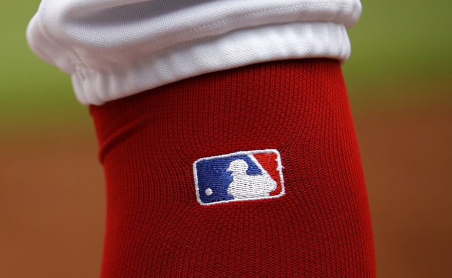Major League Baseball and its players association announced it would remove marijuana from its "drugs of abuse" list and begin testing for newly added drugs, such as opioids.