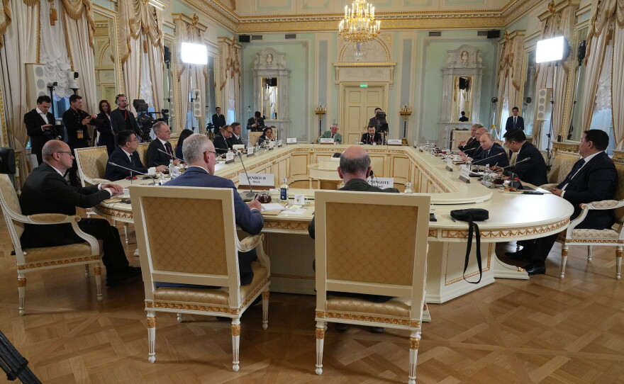 Russian President Vladimir Putin, background third right, meets with representatives of international news agencies on the sidelines of the St. Petersburg International Economic Forum at the Constantine Palace in St. Petersburg, Russia, on Thursday, June 4, 2026.