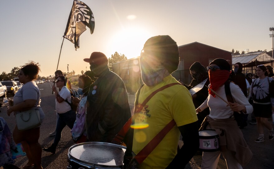 Anti hate protesters marched from the corner of Ashwood and Mapleview, in Lakeside, to the Lakeside Community Center near Lindo Lake on Saturday evening, April 23, 2022.