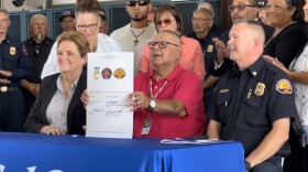 <b>Nancy Ward, Cal OES Director and Cal OES Fire Chief Brian Marshall are all smiles as </b>Pala Trial Chairman Robert Smith holds up historic agreement between the Pala Band of Mission Indians and the California Governor's Office of Emergency Services.<br/>