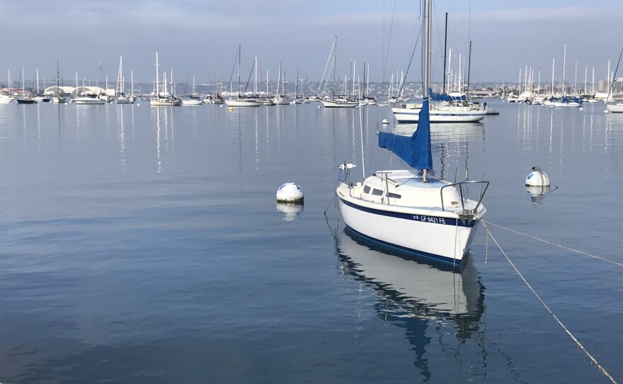 Boats rest in San Diego Bay near the Grape Street Pier on Aug. 27, 2018.