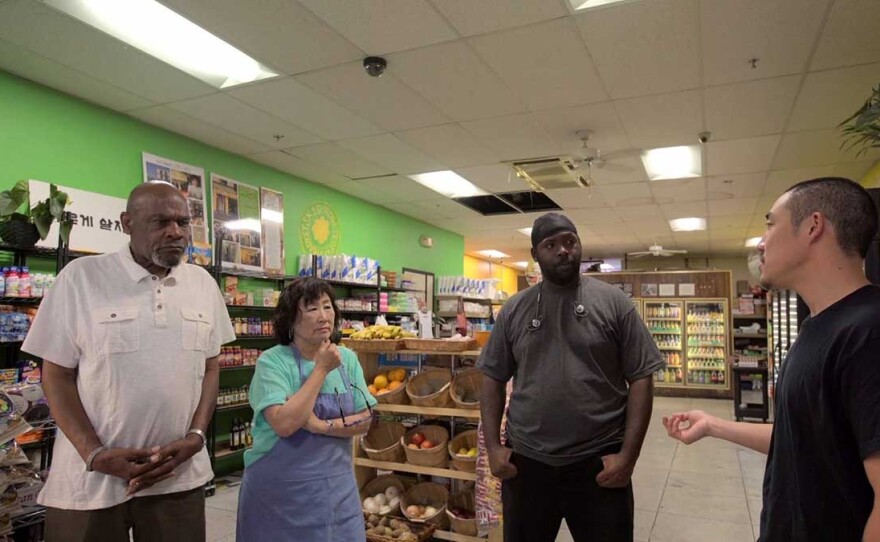 Employees of Skid Row People’s Market have a meeting