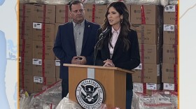 Homeland Security Secretary Kristi Noem is pictured at a podium during her visit to the Otay Mesa Port of Entry, Feb. 12, 2026.