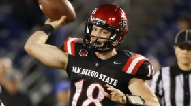 San Diego State quarterback Quinn Kaehler fires a pass against Air Force during the first half of an NCAA college football game in San Diego, Nov. 21, 2014.
