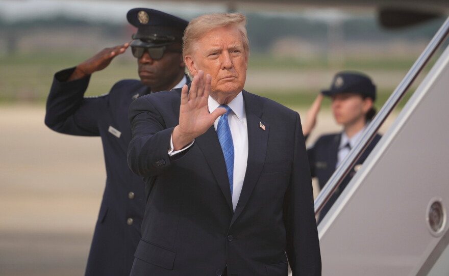 President Trump waves after arriving off Air Force One, Friday, Aug. 28, 2026, at Joint Base Andrews, Md.