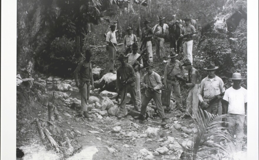 U.S. Marines and their Haitian guides in Haiti in 1919.