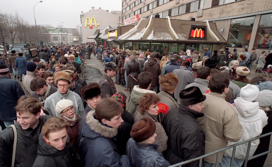 Hundreds of people line up around the first McDonald's restaurant in the Soviet Union at Moscow's Pushkin Square, on its opening day, Jan. 31, 1990.