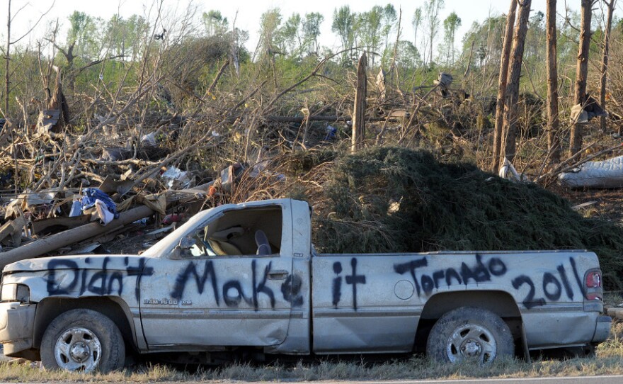 A damaged truck in a tornado-ravaged area near Rainsville, Ala.