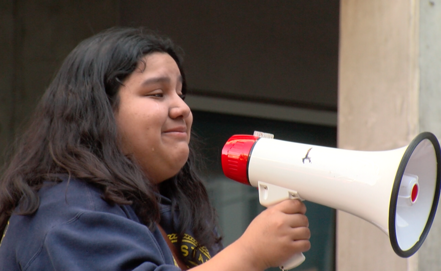 One girl breaks into tears at Trump protest, Nov. 9, 2016.