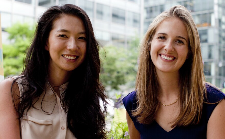 Claire Kang (left) and Laura Carey were inspired by Golden Triangle's yellow, triangular logo when designing the parklet on K Street Northwest.