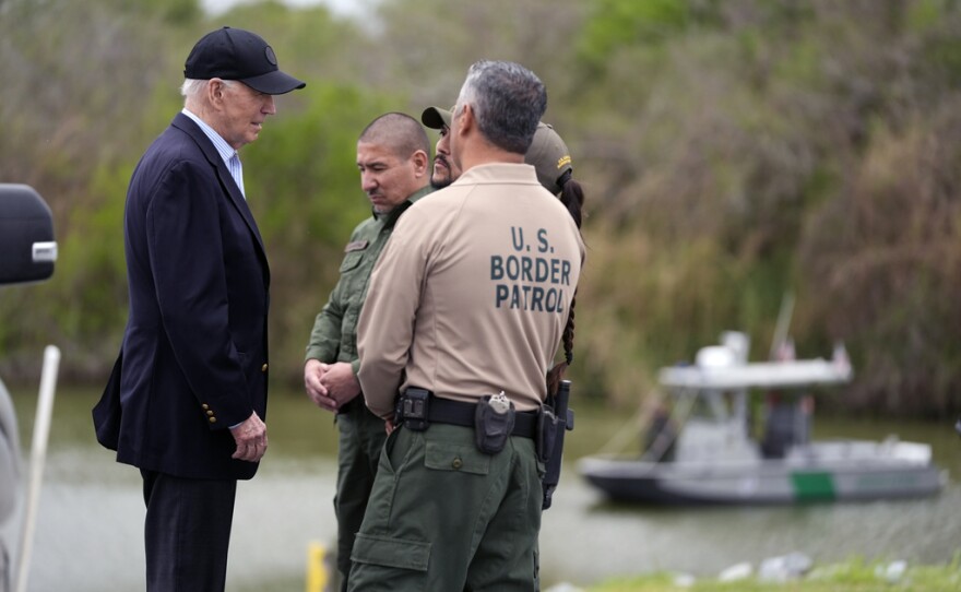 President Joe Biden talks with the U.S. Border Patrol, as he looks over the southern border, Thursday, Feb. 29, 2024, in Brownsville, Texas, along the Rio Grande. (AP Photo/Evan Vucci)