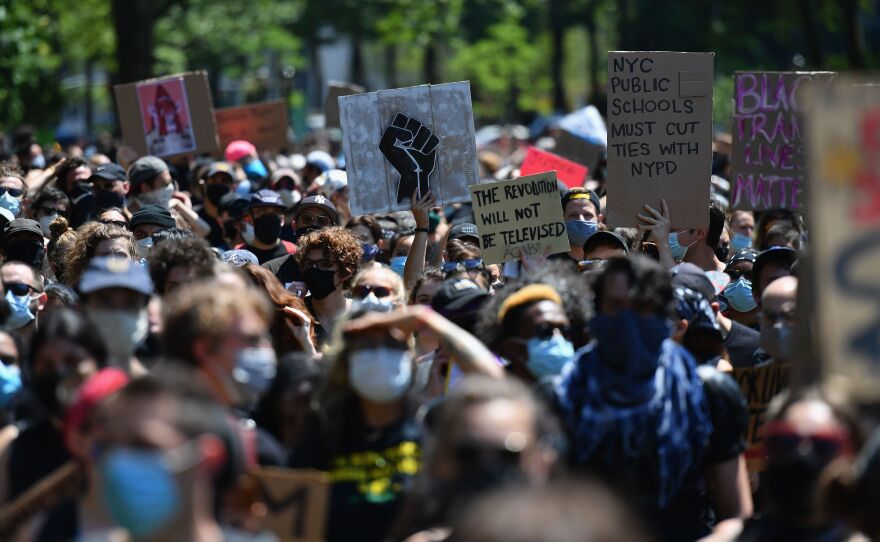 Protesters march in New York City on June 19th, as ongoing demonstrations against police brutality and racism continued through Juneteenth, the holiday that marks the end of slavery in the U.S. Donations to bail funds spiked as protests spread across the country earlier this month, surprising many nonprofits that suddenly saw their resources swell.