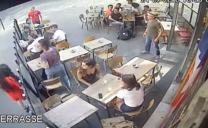 A video showing a man punching a woman, posted by Marie Laguerre, has resulted in a man being taken into custody.