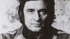 Johnny Cash (pictured/ undated photo) is joined by Linda Ronstadt and Roy Clark for a concert behind prison walls.