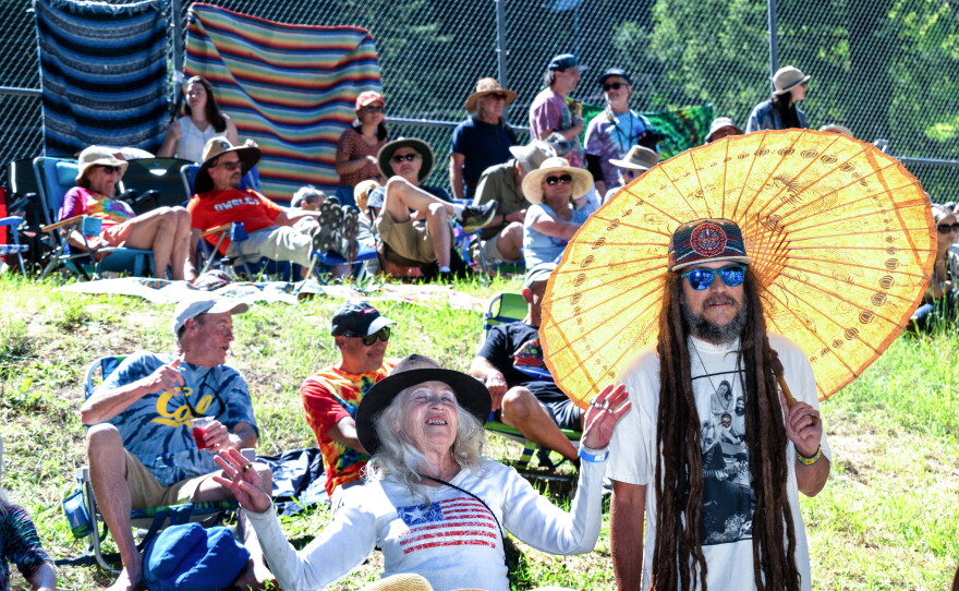 Fans listen to Terrapin Roadshow as they perform at Monte Rio Amphitheater in Monte Rio, CA for a story about the longevity of the Grateful Dead's music and cultural scene.
