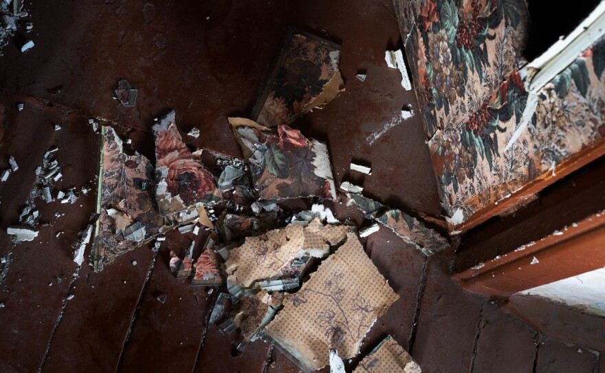 Signs of destruction can be seen throughout the building that Zahorodnikh lives in from just after Izium was liberated from Russian forces in September.