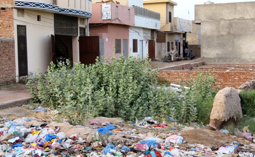 Trash is scattered in the alley leading to the house on the outskirts of Multan where Qandeel Baloch was murdered.