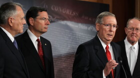 U.S. Senate Minority Leader Sen. Mitch McConnell (R-KY) (3rd L) speaks as (L-R) Senate Minority Whip Sen. Jon Kyl (R-AZ), Sen. John Barrasso (R-WY), and Sen. Lamar Alexander (R-TN) listen during a news conference July 12, 2011 on Capitol Hill in Washington, DC. 