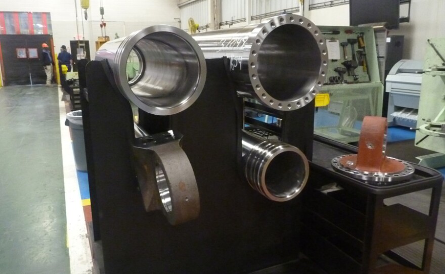 Strut housing for truck waiting to be assembled.