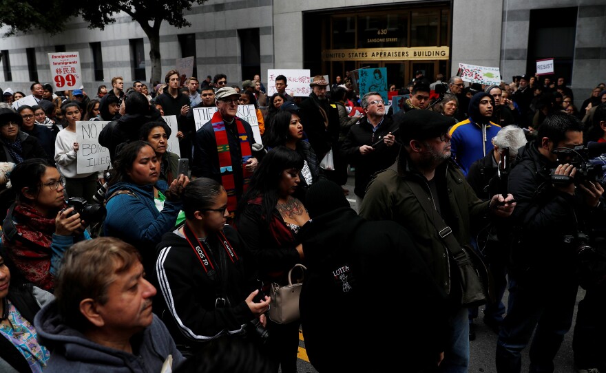 A spokesman for Immigration and Customs Enforcement in San Francisco has resigned, citing disagreements over how to cast the actions of Oakland Mayor Libby Schaaf, who warned against immigration raids last month. The raids prompted a rally outside the ICE office in San Francisco.