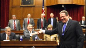 Former Vice President Al Gore greets members of a joint congressional hearing on climate change.