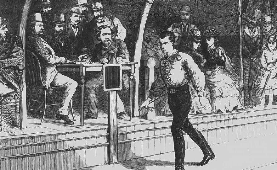 <strong>Walking The Walk:</strong> Fans look on as pedestrian Edward Payson Weston walks at a New York City roller rink in 1874. His unique stride was described as "wobbly."