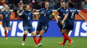 Sonia Bompastor (#8) of France celebrates after she scores her team's equalizing goal during the FIFA Women's World Cup 2011 Semi Final match between France and USA at Borussia-Park on July 13, 2011 in Moenchengladbach, Germany. 