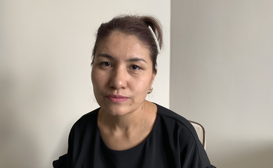 Gulserik Kazykhan is struggling to get more information about her detained brother-in-law from visiting relatives. "If you don't return, the guarantors will suffer."