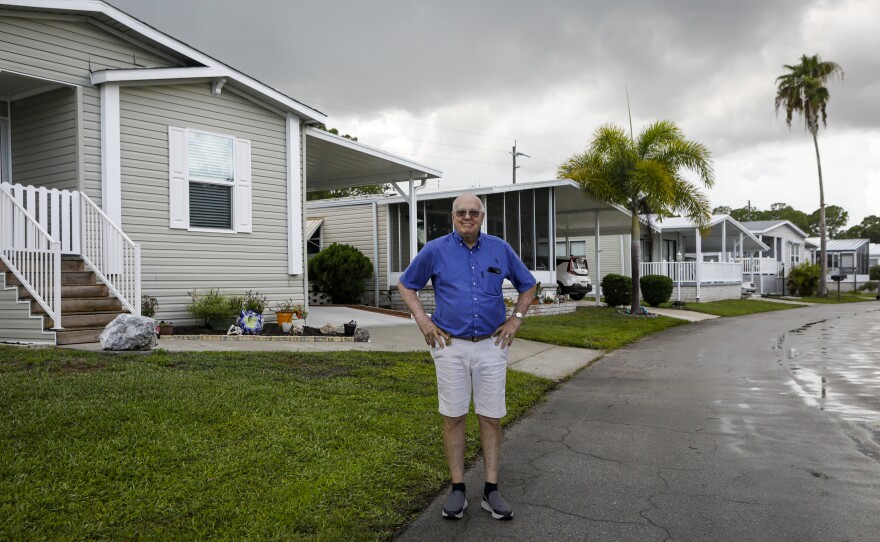 Stanley Paxton at the site where he fell at Heritage Plantation. He and other residents say floodwaters often leave behind a slimy residue that's easy to slip and fall on. Wednesday, June 8, 2022, in Vero Beach.