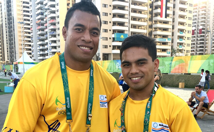 Ovini Uera (far left) and Elson Brechtefeld are the two sole delegates from Nauru.