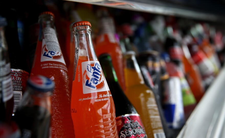 Five U.S. cities which imposed taxes on sugary drinks saw prices rise and sales fall by 33%, according to a new study.