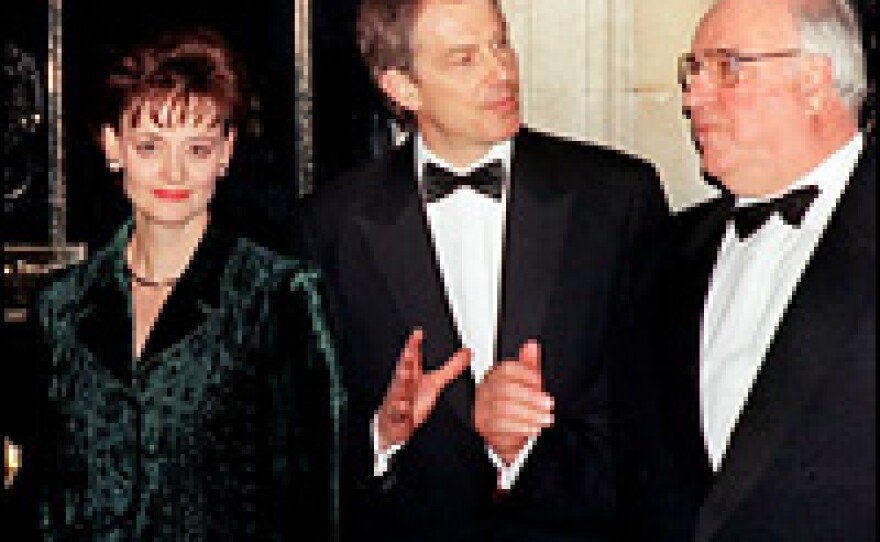<strong>Silent No More</strong>: Cherie Blair, seen here with Tony Blair (center) and Germany's Helmut Kohl in 1998, is opening a window on the goings-on at No. 10 Downing Street.