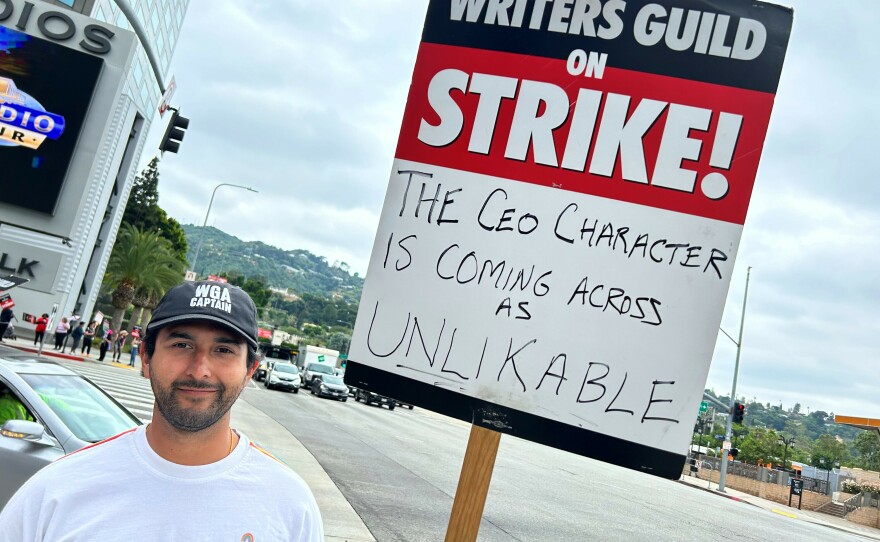 Cheech Manohar is a WGA strike captain and a member of SAG-AFTRA. "We know that we're fighting the good fight. And a month in, with the amount of money that the studios have lost, we know that this is not just about pay. It's also about protection and power."