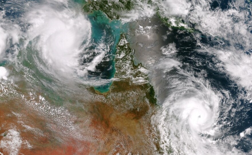 Cyclones Lam and Marcia, before they made landfall in Australia on Thursday.