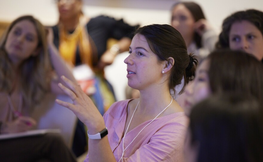 Kate Speer speaking at a summit for mental health influencers held at the Harvard T.H. Chan School of Public Health in August.