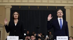 Former White House national security aide Fiona Hill, left, and David Holmes, a U.S. diplomat in Ukraine, are sworn in to testify before the House Intelligence Committee on Capitol Hill in Washington, Thursday, Nov. 21, 2019. 