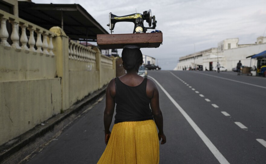 This photo, from Cape Coast, Ghana, is titled "Carrying Her Future." It's one of the honorees from this year's All About Photo Awards.