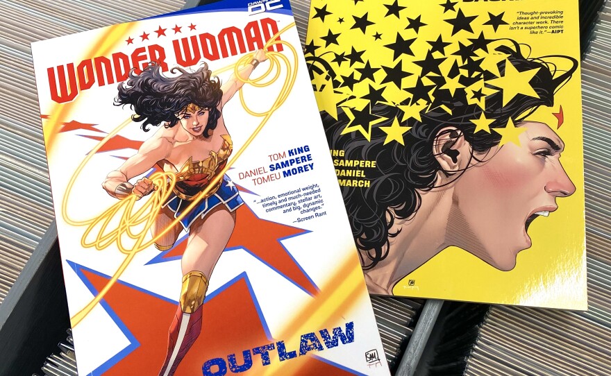 Copies of the Wonder Woman comics, "Wonder Woman Vol. 1: Outlaw" and "Wonder Woman Vol. 2: Sacrifice" are seen in this photo taken Dec. 16, 2024.