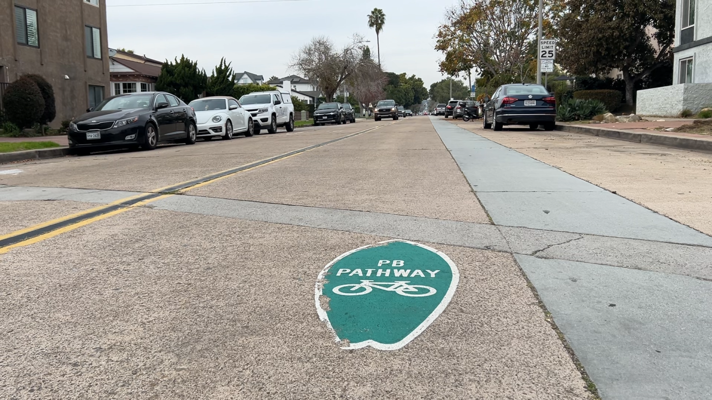 A sign marks this road as part of the PB Pathway, designed to provide a safer route for cyclists through the community on Jan. 21, 2026.