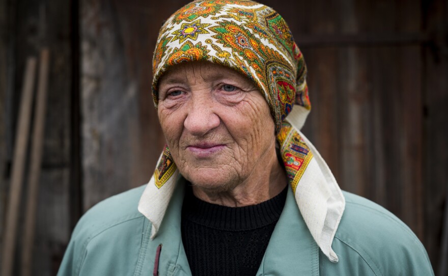 "I'm retired, and I can't do this cleanup myself," says Hanna Yurchenko, 66. "I'm just so grateful for these kids." Yurchenko's home was destroyed by a Russian strike.